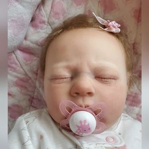 Artist painted reborn newborn baby
